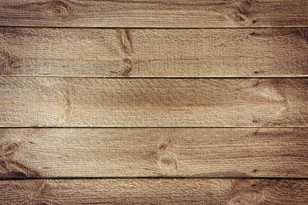 Rustic table background from horizontal wooden boards with nailsの写真素材