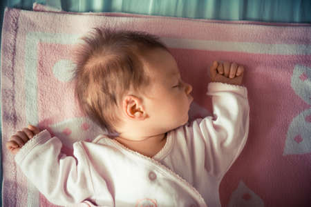 Sleeping newborn babyの写真素材