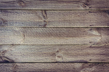 Rustic planked fence from horizontal wooden boards with nailsの写真素材