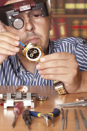 Watch repair craftsman repairing watch  Focus on watchの写真素材