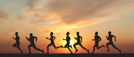 Marathon, black silhouettes of runners on the sunsetの写真素材