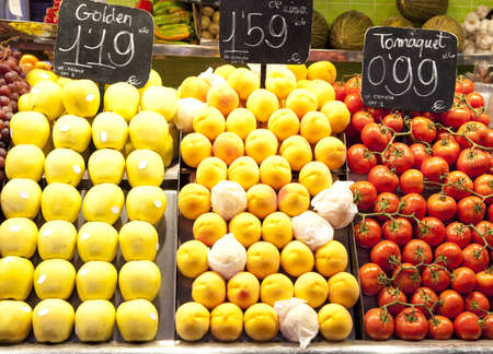Tomato, apple, peach on market の写真素材