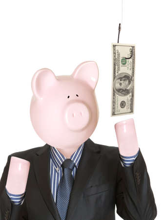 Businessman with a piggy bank head and hundred dollars on fishing hookの写真素材