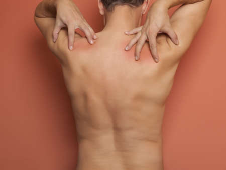 Adult man having pain in his back 
