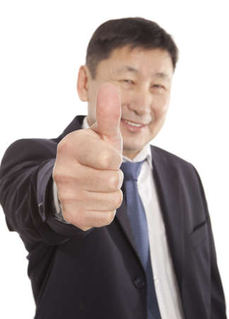Happy asian business man going thumbs up. Isolated on white backgroundの写真素材