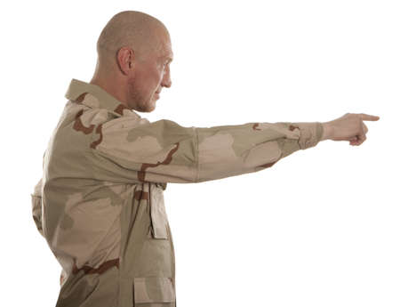 Marine in camouflage standing on a white backgroundの写真素材