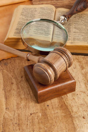 Wooden gavel and old bookの写真素材