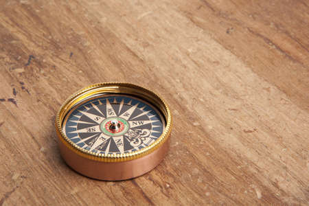Vintage compass on old grunge paper の写真素材