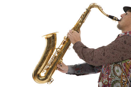 Portrait of a man playing on saxophone isolated on background の写真素材