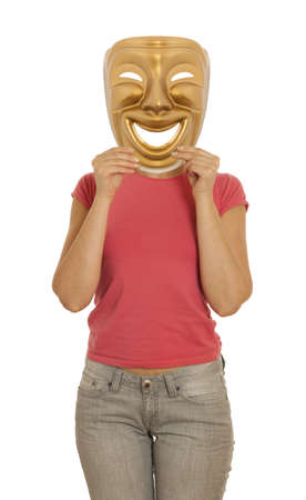 A woman holding a gold mask theater comedyの写真素材
