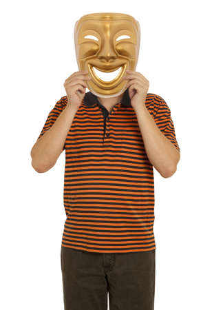 A man holding a gold mask theater comedyの写真素材