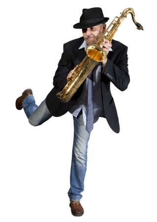 Saxophonist. Middle aged man playing on saxophone isolated on backgroundの写真素材