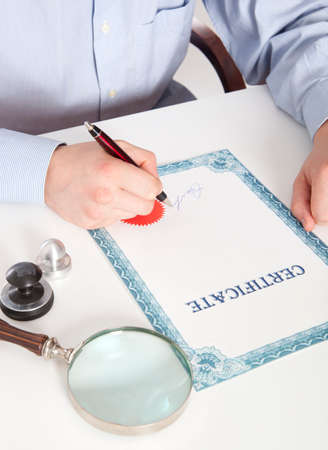 Lawyer, notary signs the documents from our officeの写真素材