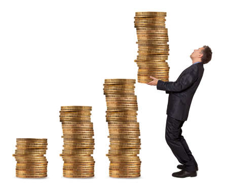 Businessman holding a stack of golden coins