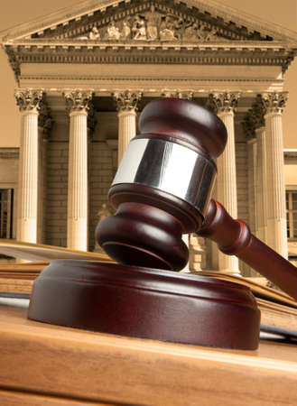 Gavel against the background of the courthouse