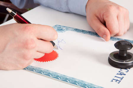 Lawyer signs the documents