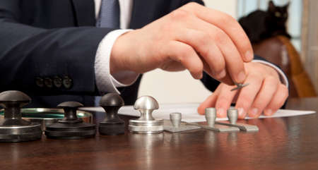 Lawyer, notary signs the documents from our officeの写真素材