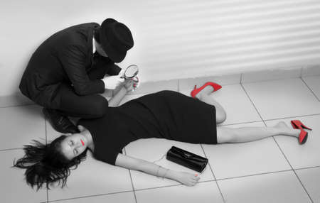 Detective investigating the crime sceneの写真素材