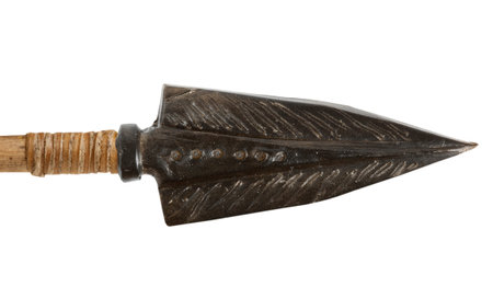 Antique old arrowhead. The army of Genghis Khan. Isolated on a white background