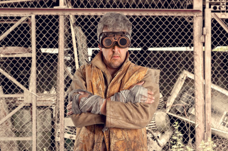 Steampunk man wearing glasses. Post-apocalypse fantasy