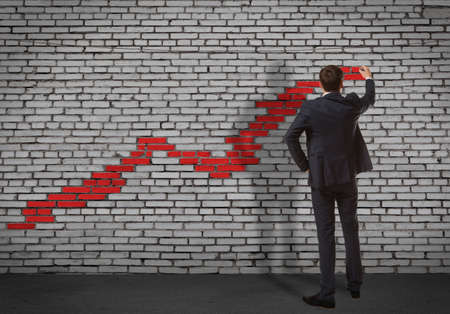 Businessman drawing increasing graph.  Business conceptの写真素材