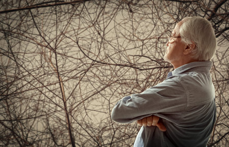 Autumn. Portrait of a senior man thinking about something