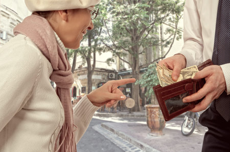 Wealthy businessman gives a woman the money. Vintage style
