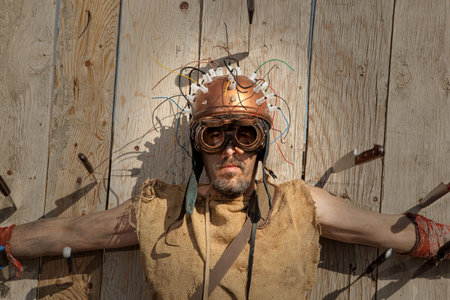 Steampunk man wearing glasses. Post-apocalypse fantasy