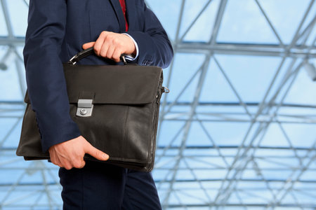 Portfolio investor. Businessman with briefcase