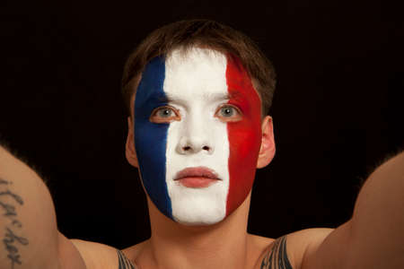 French fans at the stadium. Football, soccer fan. Black backgroundの写真素材