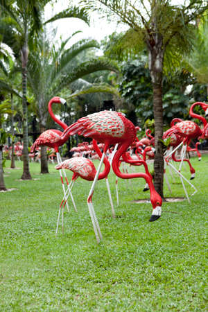 Sculptures of pink flamingosの写真素材