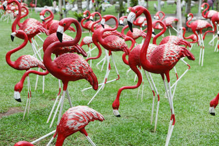 Sculptures of pink flamingosの写真素材