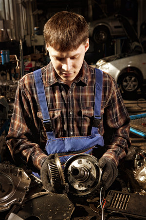 Mechanic. Auto repair service. Photo in old image vintage style