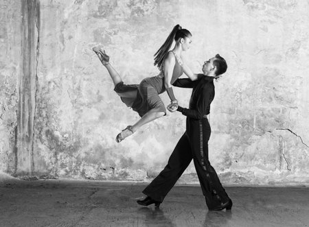 Dance beautiful couple dancing ballroom dancing on wall background