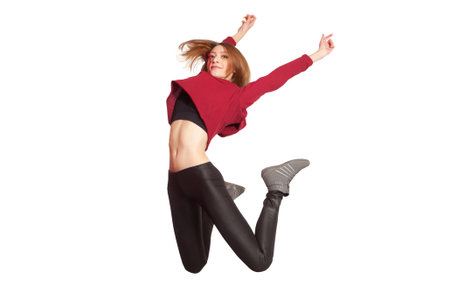 Young casual woman jumping. Isolated on white