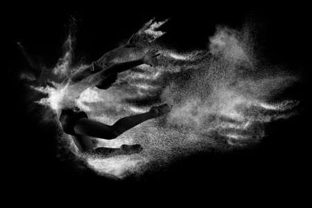 Young handsome ballet man in fly grace pose. Dance freedom concept