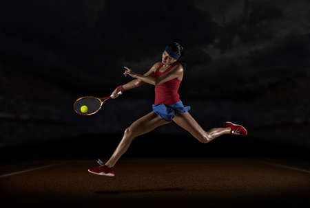 Female tennis player in action during gameの写真素材