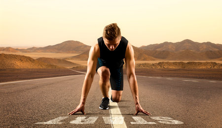Man sprinter leaving starting. Exploding start