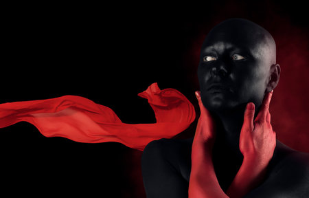 Fantasy style. Red art portrait. Beauty fashion model with dark make-up