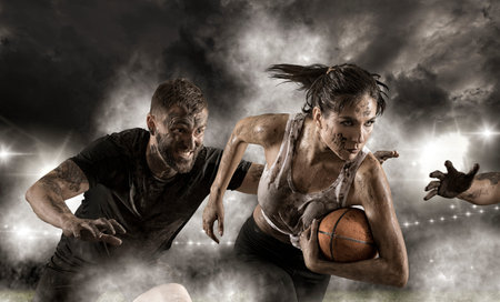 Handsome woman rugby player. Rugby woman player holds ball