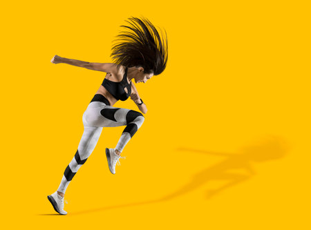 Sporty woman running on isolated on yellow background. Sports banner