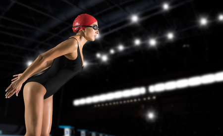 Sporty woman on swimming pool background. Sports bannerの写真素材