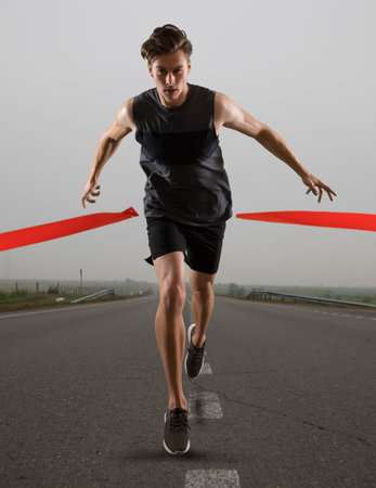 Runner wins by crossing the finish line. Sport and fitness motivation