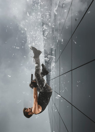 Excited man holding gun. Movie concept. Mixed media