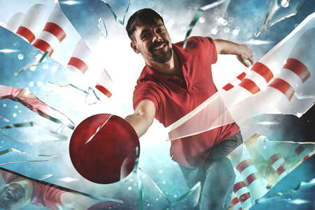 Professional bowling player in action. Concept of sport, movement, energy, dynamic, healthy lifestyleの写真素材