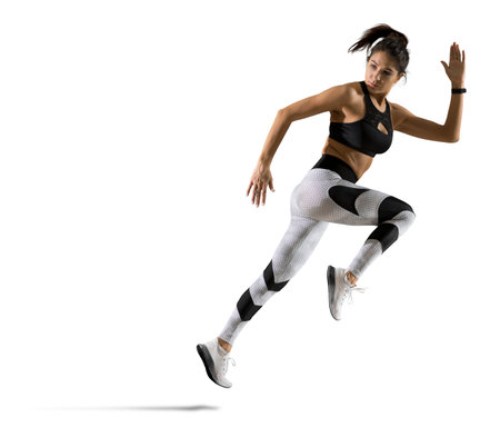 Sporty young woman running. isolated on white backgroundの写真素材
