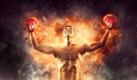 Boxer in red gloves on fire background. toned imageの写真素材