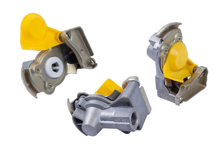 Pneumatic connecting heads with a valve on an isolated white background.