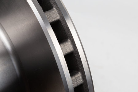 new truck brake disc. side view of the spare parts of the car, isolated on a white background....