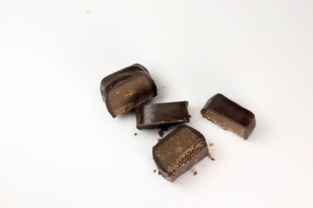 Four of the same piece of chocolate candyの写真素材